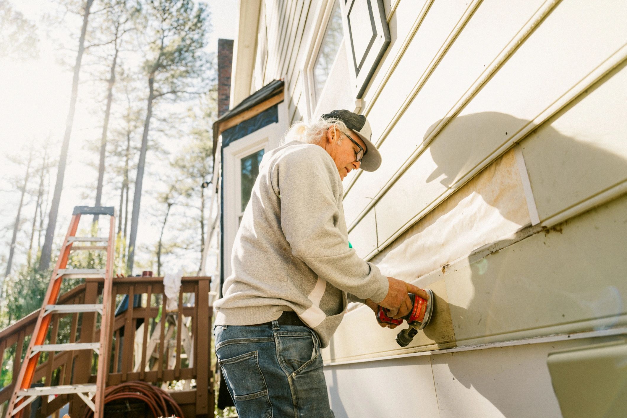 Professional repairing exterior house siding